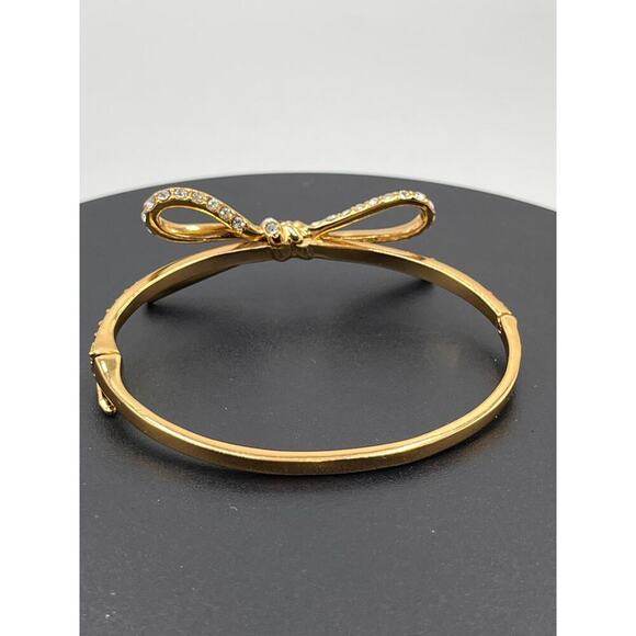 Kate Spade NY Skinny Mini Pave Bow
Gold Plated Hinged Bangle Feminine Bracelet - Picture 3 of 9